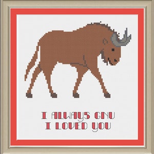 Puede incluir: Patrón de punto de cruz con un ñu marrón con el texto "I always GNU I loved you".