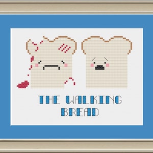 Puede incluir: Patrón de punto de cruz con dos rebanadas de pan de dibujos animados. Una rebanada está entera y la otra está rasgada con puntadas rojas que representan sangre. El texto debajo dice "The Walking Bread".