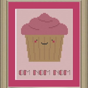 May include: A pink and brown pixelated cupcake with a happy face and the text "OM NOM NOM" below it.