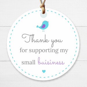 May include: A white circle tag with a blue bird with a purple belly and a gray heart. The tag has a blue dashed line border and the text "Thank you for supporting my small business".