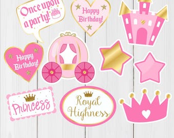 May include: A set of 10 printable princess party photo booth props. The props include a pink castle, a carriage, a crown, a star, a heart, and speech bubbles with the text "Once upon a party!" and "Happy Birthday!" The props are perfect for a princess-themed party.