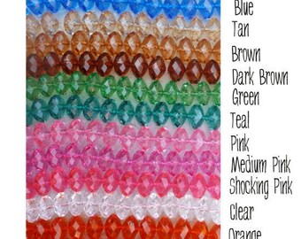 Könnte beinhalten: Sortiment von 22 mm facettierten Glasperlen in verschiedenen Farben, darunter Pflaume, Lila, Hellblau, Blau, Braun, Dunkelbraun, Grün, Türkis, Rosa, Mittelrosa, Schockrosa, Klar, Orange, Rot, Grau und Schwarz.