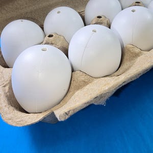 CLEARANCE - Life Size White Plastic Eggs - 1 Dozen