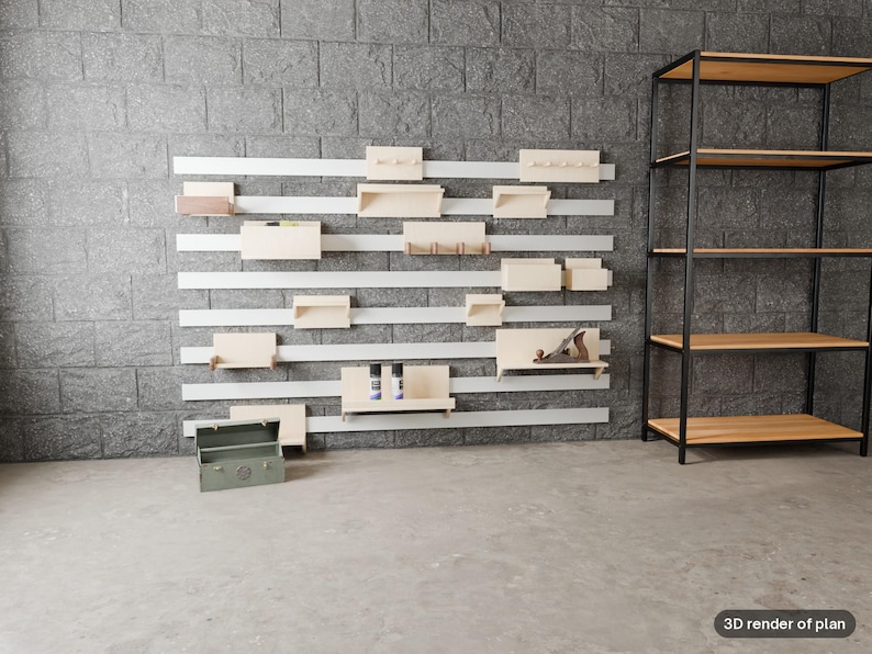 Puede incluir: Un sistema de almacenamiento modular montado en la pared con listones horizontales blancos y varios estantes, ganchos y cajas de madera clara. A la derecha hay una estanter&iacute;a alta de metal con estructura abierta y niveles de madera clara.