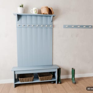 Peut inclure: Un meuble d'entr&eacute;e bleu clair avec un dossier &agrave; panneaux verticaux, une &eacute;tag&egrave;re sup&eacute;rieure et un banc avec une &eacute;tag&egrave;re de rangement inf&eacute;rieure. L'unit&eacute; comporte plusieurs crochets blancs. Un porte-manteau mural assorti est fix&eacute; &agrave; droite.