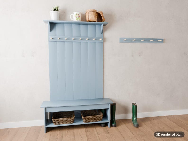 Peut inclure: Un meuble d'entr&eacute;e bleu clair avec un dossier &agrave; panneaux verticaux, une &eacute;tag&egrave;re sup&eacute;rieure et un banc avec une &eacute;tag&egrave;re de rangement inf&eacute;rieure. L'unit&eacute; comporte plusieurs crochets blancs. Un porte-manteau mural assorti est fix&eacute; &agrave; droite.