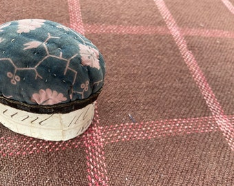 pin cushion with base covered in early 1826 account page top with antique indigo resist