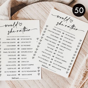 May include: A printable "Would She Rather" game with 50 questions for a bridal shower or bachelorette party. The questions are written in black ink on a white background with a heart symbol.