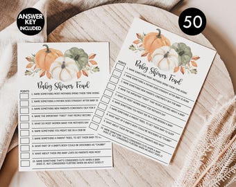 Op de afbeelding: Een printbaar babyshower-spel met een herfstthema. Het spel heet "Baby Shower Feud" en bevat een aquarelillustratie van pompoenen en bladeren. Het spel bevat 10 vragen voor de gasten.