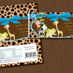 May include: A blue and brown chocolate bar wrapper with a leopard print design. The wrapper features a blue bow, a giraffe, a zebra, a monkey, and an elephant. The text on the wrapper reads "Gabriella Marie's Baby Shower" and "March 22, 20XX".