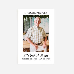 May include: In loving memory of Michael A. Harris. A black and white photo of a man in a plaid shirt standing in front of a wooden table. The text "OCTOBER 11 19XX - MAY 02 20XX" is below the photo.