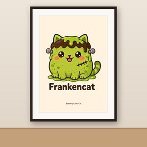 May include: A framed art print featuring a light green cat with dark green spots, brown hair, and silver bolts on its head. The cat has a stitched scar on its side and sits in a puddle of green slime. The text reads Frankencat and Bakery Cats Co.
