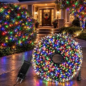 May include: A coiled strand of multi-colored LED string lights featuring small, vibrant bulbs in red, green, blue, and yellow. The set includes a black electrical power adapter with a two-prong plug, designed for outdoor holiday illumination.