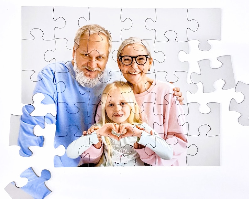 Custom Puzzle Gift Fast. Personalized Kids photo puzzle. Personalized Jigsaw Puzzle for the puzzle lover.  This 30 piece kids puzzle shows grandparents with granddaughter cut into a personalized puzzle that is being assembled.