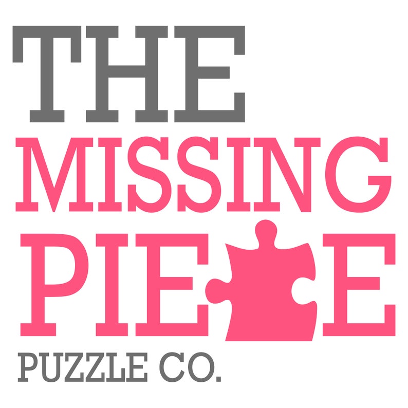 May include: The Missing Piece Puzzle Co. logo on a white background. The text "THE" is in gray, above "MISSING PIECE" in pink, with a pink puzzle piece replacing the letter "E". "PUZZLE CO." is in gray.