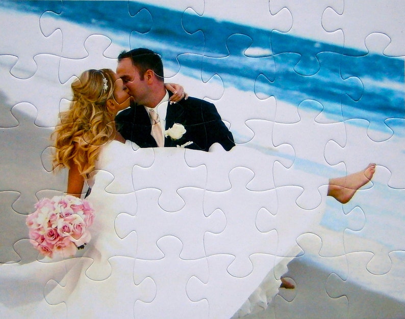 Personalized puzzle gift
of a bride and groom kissing on beach.  This photo puzzle is a gift for the best couples gift that is personalized.