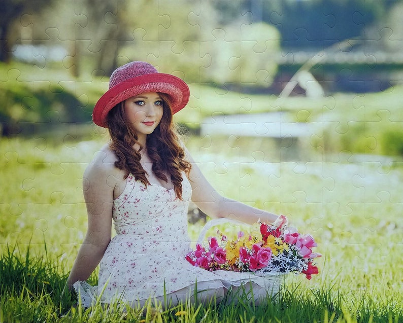 Custom puzzle of teen girl holding a basket of flowers.  Personalized puzzle of woman wearing hat and holding colorful flowers.