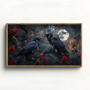 May include: A framed art print featuring two black ravens perched on a branch with red roses, set against a night sky with a full moon. The artwork has a gothic or fantasy theme, with a wooden frame.