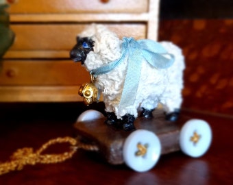 Dollhouse miniature pull along toy.Cute Baby sheep lamb miniature for your nursery .Suits 1:12 scale or a bit larger