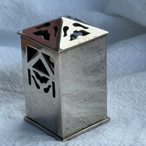 Vintage chrome colored metal perfume dabber with slide opening cover