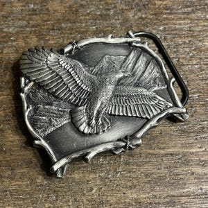 Vintage Flying Eagle pewter colored raised wilderness design Belt Buckle 1995 USA