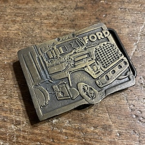 Vintage Ford Tractor Trailer Truck figural brass colored belt buckle