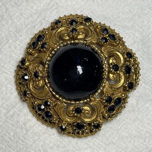 Vintage Florenza signed designer black dome shaped cabochon and  rhinestone gold colored Pin Brooch