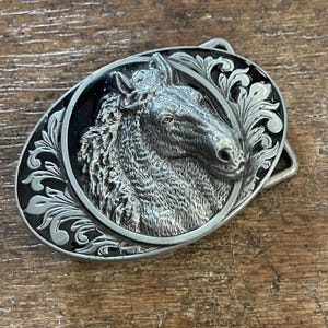 Western style belt buckle horse head figural Silver colored with black enamel Belt Buckle
