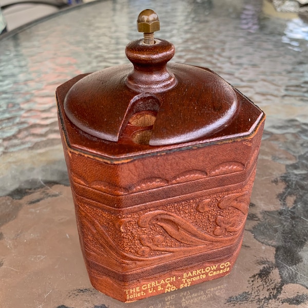 Vintage Antique The Gerlach Barklow Co wooden rotator cigarette dispenser with embossed leather wrap