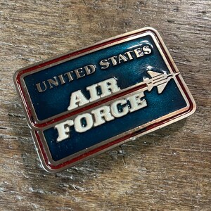 United States Air Force jet design Pewter colored enameled belt buckle