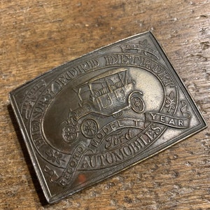 Henry Ford Detroit Automobiles Model T advertising brass colored belt buckle