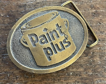 Vintage buckle Paint Plus Advertising brass colored belt buckle