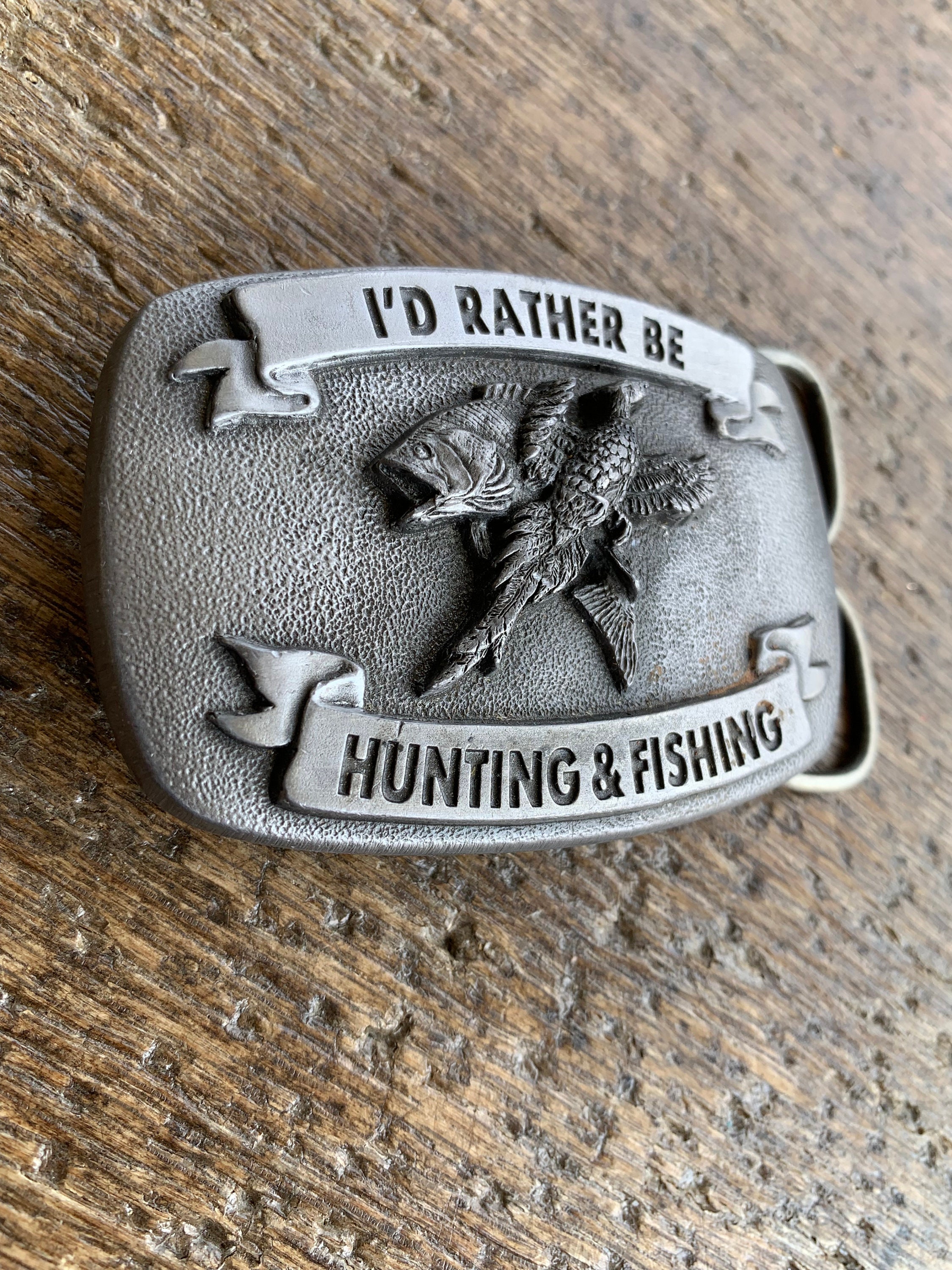 jeanniesjewels1 Vintage I'd Rather Be Hunting & Fishing Fish and Game Bird Raised Design Oval Pewter Colored Belt Buckle