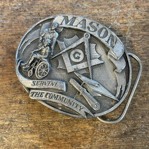 Vintage Freemason Masonic Serving the Community themed pewter colored belt buckle 1992 Siskiyou