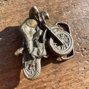 Vintage Motorcycle Motocross figural design brass colored belt buckles