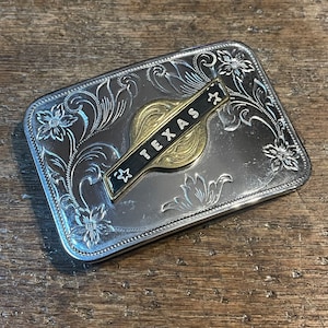 Vintage buckle Texas raised design vines chrome and brass colored belt buckle