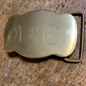 Vintage buckle Engraved Script “ART” art solid brass belt buckle.