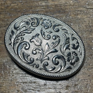 Vintage Floral and Vines Western themed chrome colored belt buckle USA