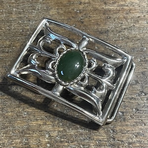Vintage belt buckle western open vines design with green cabochon chrome colored belt buckle