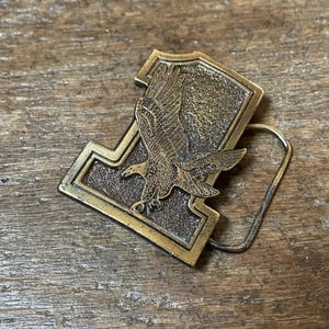 Vintage wildlife flying eagle number one design brass belt buckle