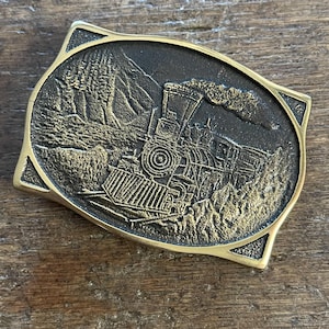 Vintage Buckle Railroad locomotive in mountains solid brass belt buckle American railroad Heritage Mint 1976