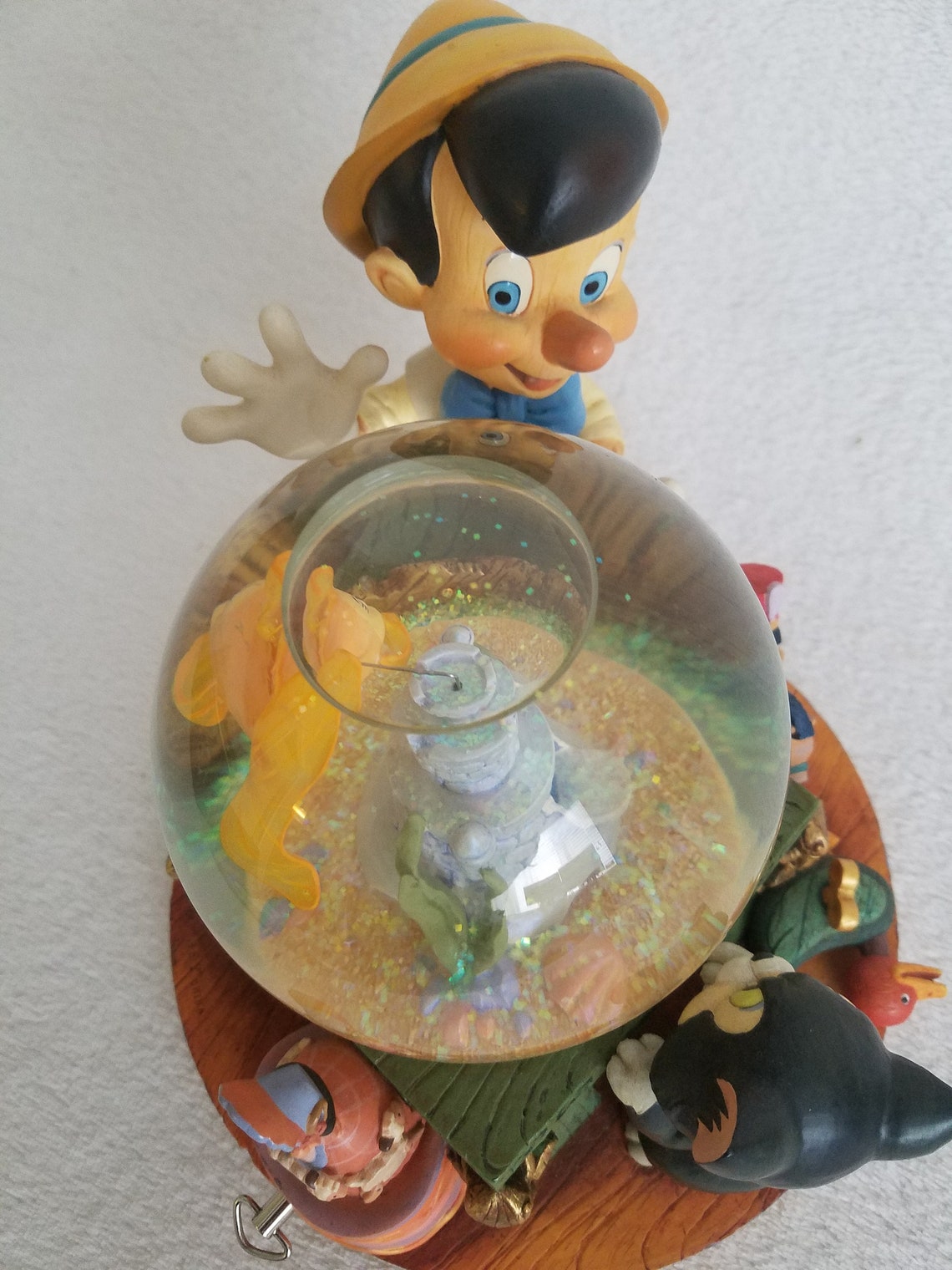 Pinocchio Snow Globe, Unique Music Box That Plays toyland by Victor