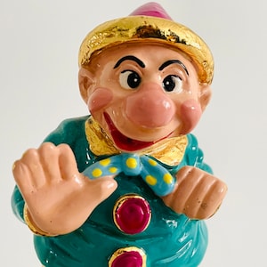 Ron Lee “Pudge” Clown Sculpture signed by artist year 1992, green jacket, green shoes, gold shorts, 24k gold plated, onyx base, CCG2