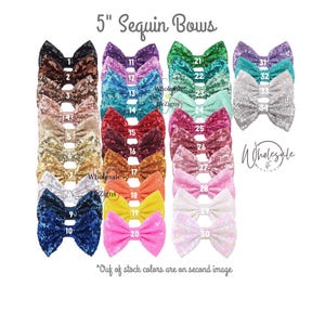 May include: A collection of 5-inch sequin bows in various colors, including black, brown, gold, blue, pink, and green. Each bow is numbered for easy selection. The image also includes the text "Wholesale Designs".
