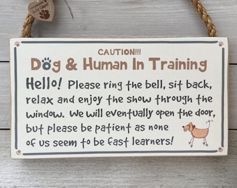 Handmade wooden door sign for dog (and human) in training.