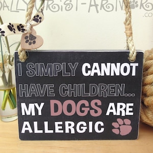 Funny sign for a dog lover I simply cannot have children... image 1