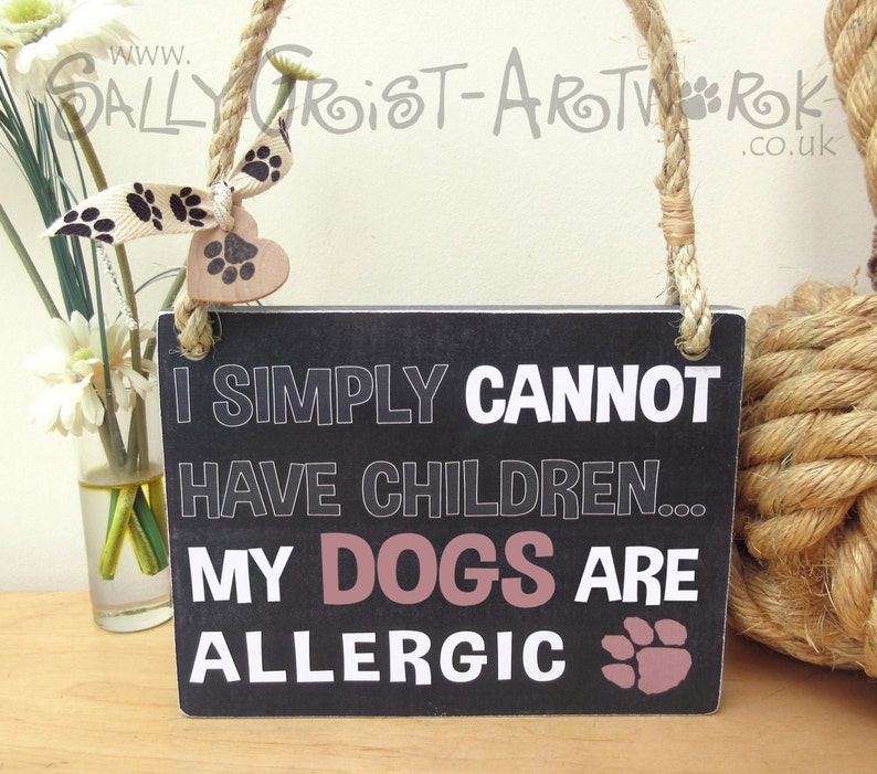 Funny sign for a dog lover I simply cannot have children... image 1
