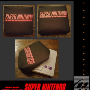 May include: A black cover featuring the pink text "SUPER NINTENDO ENTERTAINMENT SYSTEM". The image shows the cover from different angles, including one placed over a white SNES Mini console. The text "SNES MINI MODEL SNS-101" is also visible.
