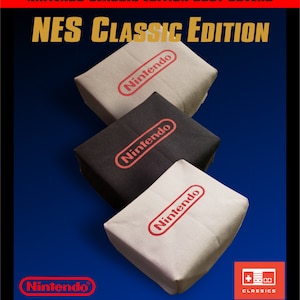 May include: Three NES Classic Edition dust covers in beige, black, and white, each with a red Nintendo logo. The covers are stacked against a blue background, with the text "NES CLASSIC EDITION" in gold.