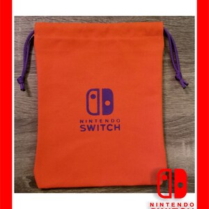 May include: An orange drawstring bag with a purple drawstring closure. The bag features the Nintendo Switch logo in purple and the words "NINTENDO SWITCH" in white. The bag is made of a soft material.